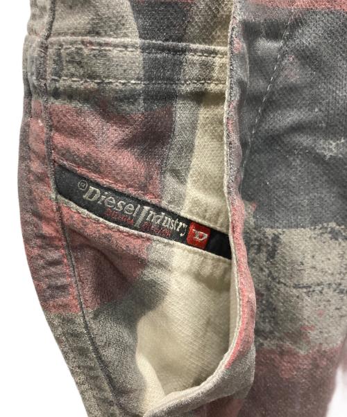 DIESEL（ディーゼル）DIESEL (ディーゼル) D-MULTY JOGG グラフィック ペイント デチャッタブル カーゴパンツ レッド サイズ:W32の古着・服飾アイテム