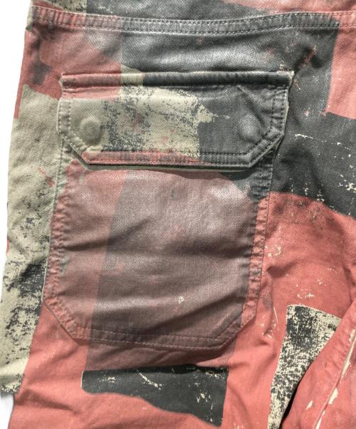 DIESEL（ディーゼル）DIESEL (ディーゼル) D-MULTY JOGG グラフィック ペイント デチャッタブル カーゴパンツ レッド サイズ:W32の古着・服飾アイテム