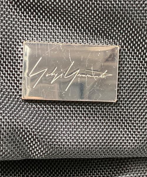 YOHJI YAMAMOTO（ヨウジヤマモト）YOHJI YAMAMOTO (ヨウジヤマモト) New Era (ニューエラ) RUCK SACK METAL LOGO/バックパック ブラックの古着・服飾アイテム