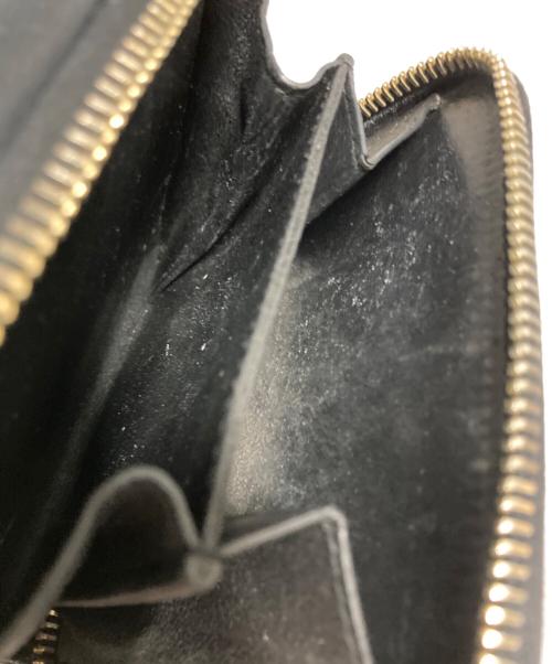 Yves Saint Laurent（イヴサンローラン）Yves Saint Laurent (イヴサンローラン) ラウンドファスナー2つ折り財布 ブラックの古着・服飾アイテム