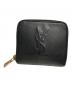 Yves Saint Laurent（イヴサンローラン）の古着「ラウンドファスナー2つ折り財布」｜ブラック