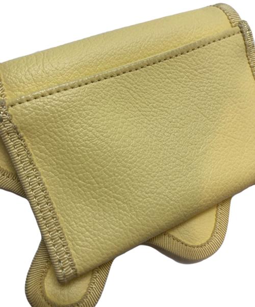 nori enomoto（ノリ エノモト）nori enomoto (ノリ エノモト) WAVE MINI イエローの古着・服飾アイテム