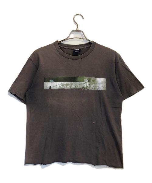 stussy（ステューシー）stussy (ステューシー) プリントTシャツ ブラウン サイズ:Lの古着・服飾アイテム
