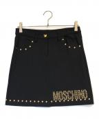 MOSCHINOモスキーノ）の古着「スタッズスカート」｜ブラック