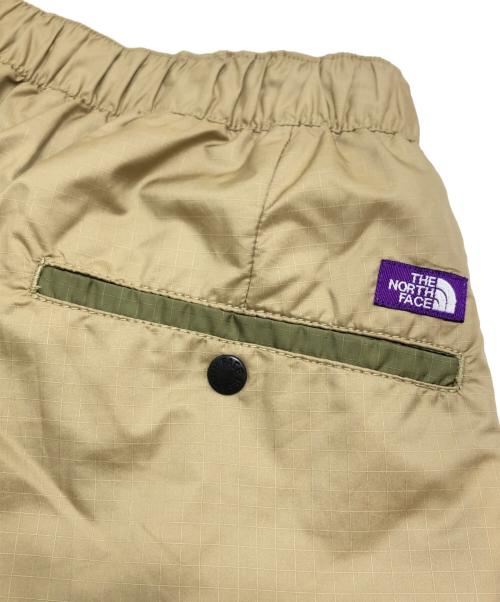 THE NORTH FACE（ザ ノース フェイス）THE NORTH FACE (ザ ノース フェイス) マウンテンウィンドパンツ ベージュ サイズ:32の古着・服飾アイテム