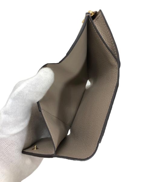 LOUIS VUITTON（ルイ ヴィトン）LOUIS VUITTON (ルイ ヴィトン) ポルトフォイユ・ゾエ モノグラム・アンプラント トゥルトレールの古着・服飾アイテム