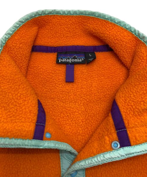 Patagonia（パタゴニア）Patagonia (パタゴニア) シンチラスナップT オレンジ×ミントグリーン サイズ:Lの古着・服飾アイテム