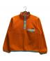 Patagonia（パタゴニア）の古着「シンチラスナップT」｜オレンジ×ミントグリーン