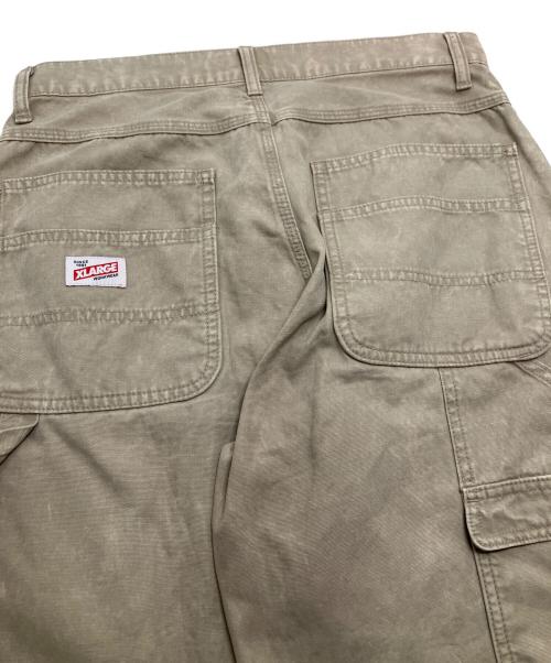 X-LARGE（エクストララージ）X-LARGE (エクストララージ) ダブルニーペインターパンツ ブラウン サイズ:W30(76CM)の古着・服飾アイテム