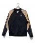 adidas（アディダス）の古着「トリコットSSTトラックジャケット」｜ブラック×ベージュ