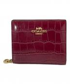 COACHコーチ）の古着「クロコ型押し2つ折り財布」｜レッド