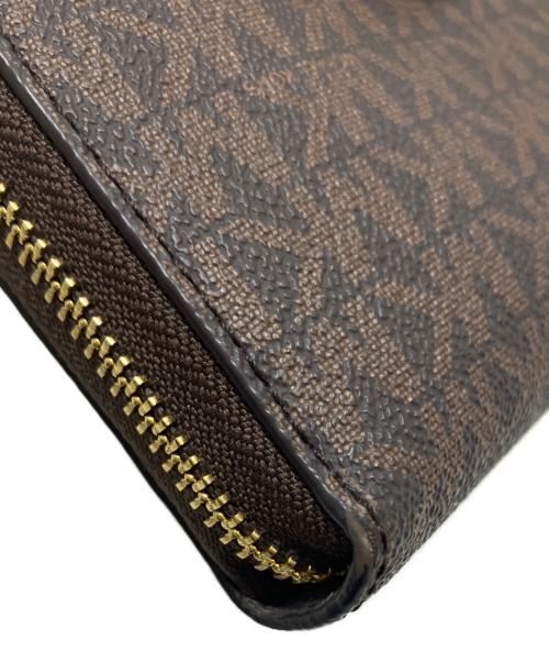MICHAEL KORS（マイケルコース）MICHAEL KORS (マイケルコース) 長財布 ブラウンの古着・服飾アイテム