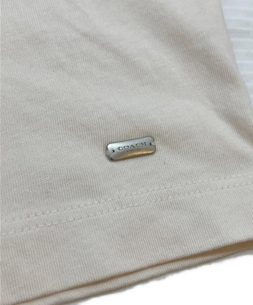 COACH（コーチ）COACH (コーチ) Disney (ディズニー) スパンコールＴシャツ ベージュ サイズ:Sの古着・服飾アイテム