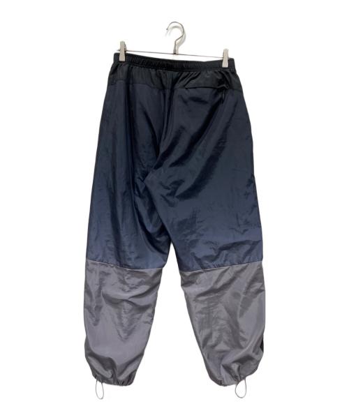 UMBRO（アンブロ）UMBRO (アンブロ) Supreme (シュプリーム) GRADIENT TRACK PANT ネイビー サイズ:Mの古着・服飾アイテム