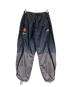 UMBRO（アンブロ）の古着「GRADIENT TRACK PANT」｜ネイビー