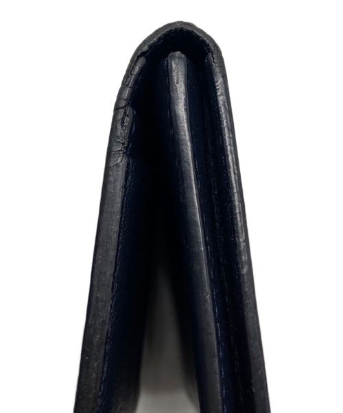 CAMILLE FOURNET PARIS（カミーユフォルネ）CAMILLE FOURNET PARIS (カミーユフォルネ) 本リザード革 2つ折り長財布 ネイビーの古着・服飾アイテム