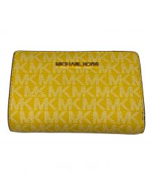 MICHAEL KORS（マイケル・コース）の古着「2つ折り財布」｜イエロー
