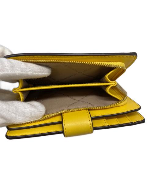 MICHAEL KORS（マイケル・コース）MICHAEL KORS (マイケルコース) 2つ折り財布 イエローの古着・服飾アイテム