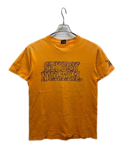 stussy（ステューシー）stussy (ステューシー) 00's プリントTシャツ オレンジ サイズ:Mの古着・服飾アイテム