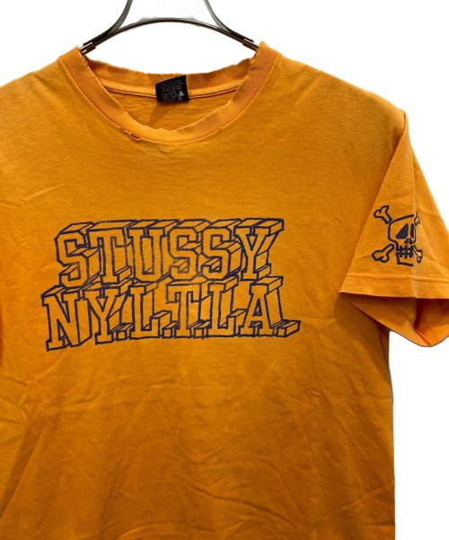 stussy（ステューシー）stussy (ステューシー) 00's プリントTシャツ オレンジ サイズ:Mの古着・服飾アイテム