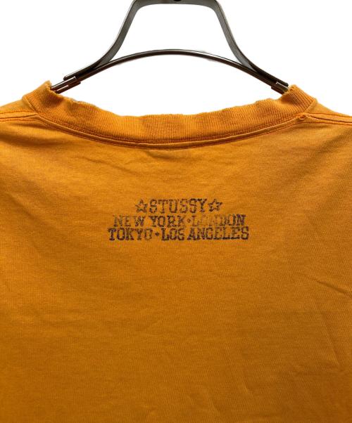 stussy（ステューシー）stussy (ステューシー) 00's プリントTシャツ オレンジ サイズ:Mの古着・服飾アイテム