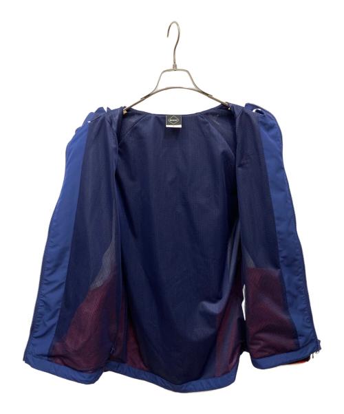 F.C.R.B.（エフシーレアルブリストル）F.C.R.B. (エフシーレアルブリストル) COCA-COLA MULTI PATTERN JACKET ネイビー×レッド サイズ:Sの古着・服飾アイテム