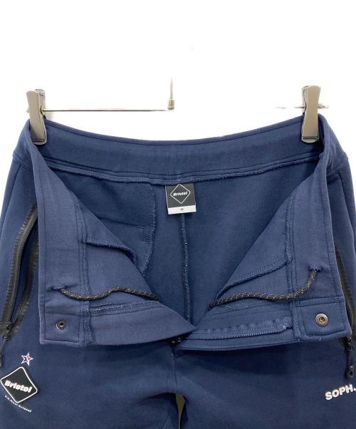 F.C.Real Bristol（エフシーレアルブリストル）F.C.Real Bristol (エフシーレアルブリストル) MLB TOUR FLAT HEM TRAINING PANTS ネイビー サイズ:Mの古着・服飾アイテム