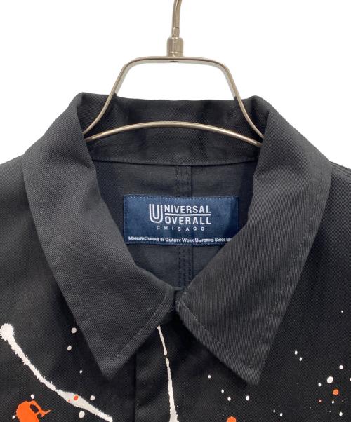 UNIVERSAL OVERALL（ユニバーサルオーバーオール）UNIVERSAL OVERALL (ユニバーサルオーバーオール) ペイント加工 スナップボタン カバーオール ブラック サイズ:Mの古着・服飾アイテム