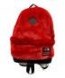 THE NORTH FACE（ザ ノース フェイス）の古着「Faux Fur Backpack」｜レッド