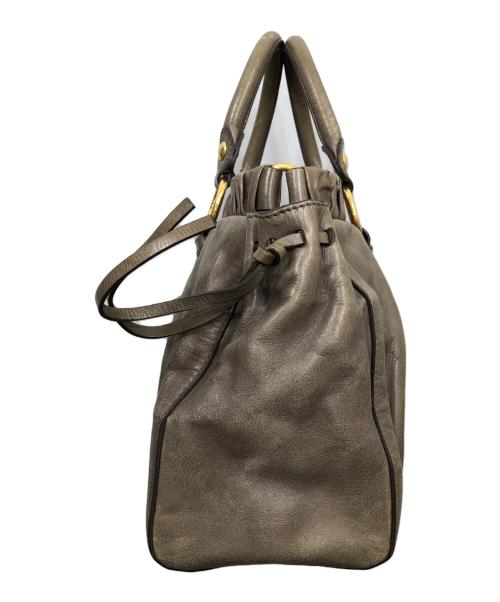 MIU MIU（ミュウミュウ）MIU MIU (ミュウミュウ) レザーハンドバッグ ベージュの古着・服飾アイテム