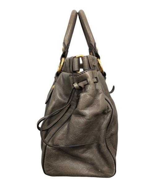 MIU MIU（ミュウミュウ）MIU MIU (ミュウミュウ) レザーハンドバッグ ベージュの古着・服飾アイテム