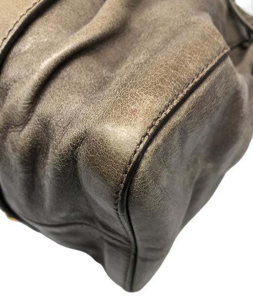 MIU MIU（ミュウミュウ）MIU MIU (ミュウミュウ) レザーハンドバッグ ベージュの古着・服飾アイテム