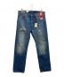 LEVI'S（リーバイス）の古着「ダメージデニムパンツ」｜インディゴ