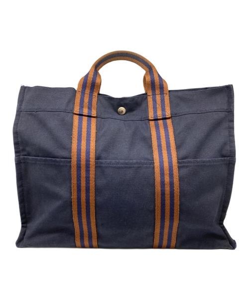 HERMES（エルメス）HERMES (エルメス) キャンバストートバッグ オレンジ×ネイビーの古着・服飾アイテム