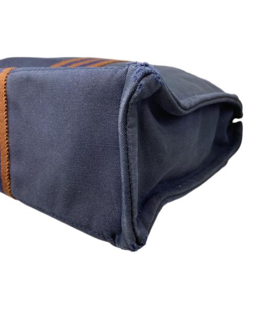 HERMES（エルメス）HERMES (エルメス) キャンバストートバッグ オレンジ×ネイビーの古着・服飾アイテム