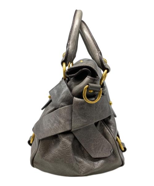 MIU MIU（ミュウミュウ）MIU MIU (ミュウミュウ) 2WAYサイドリボンバッグ グレーの古着・服飾アイテム