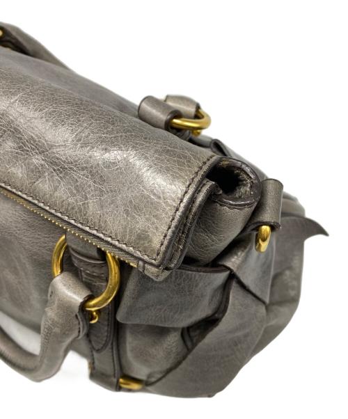 MIU MIU（ミュウミュウ）MIU MIU (ミュウミュウ) 2WAYサイドリボンバッグ グレーの古着・服飾アイテム