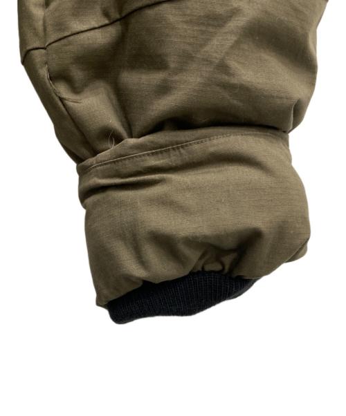 GRIP SWANY（グリップスワニー）GRIP SWANY (グリップスワニー) ファイアプルーフ ダウンジャケット オリーブ サイズ:Lの古着・服飾アイテム
