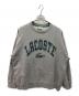 LACOSTE（ラコステ）の古着「ロゴプイントスウェット」｜グレー