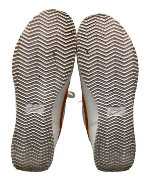 NIKE（ナイキ）NIKE (ナイキ) スニーカー ホワイト×オレンジ サイズ:27の古着・服飾アイテム