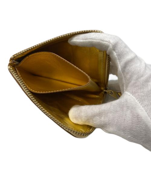 COMME des GARCONS（コムデギャルソン）COMME des GARCONS (コムデギャルソン) CDG WALLET L字ファスナーウォレット ゴールドの古着・服飾アイテム