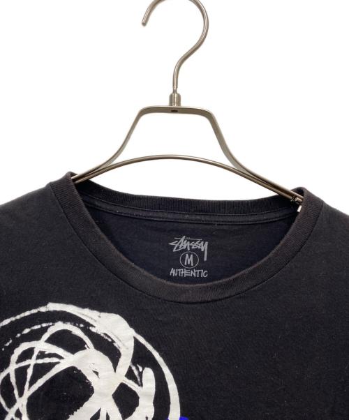 stussy（ステューシー）stussy (ステューシー) FUTURE (フューチャー) プリントTシャツ ブラック サイズ:Mの古着・服飾アイテム