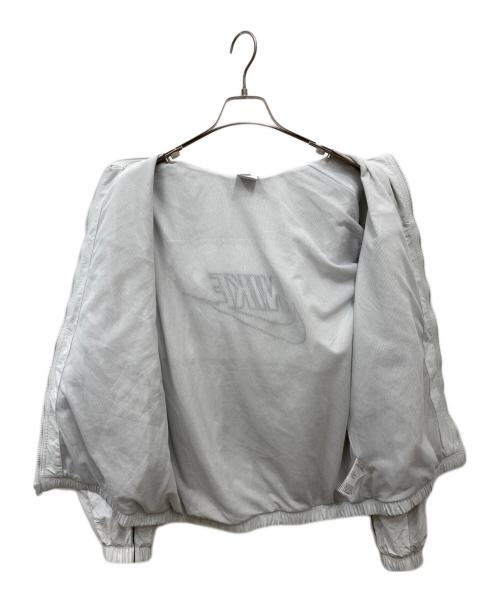 NIKE（ナイキ）NIKE (ナイキ) クラブ アスリート フード付きジャケット グレー サイズ:Mの古着・服飾アイテム