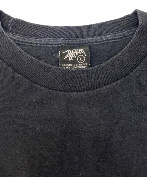 stussy（ステューシー）stussy (ステューシー) 25th Anniversary 1/4 プリントTシャツ ブラック サイズ:XLの古着・服飾アイテム