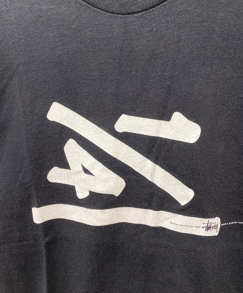 stussy（ステューシー）stussy (ステューシー) 25th Anniversary 1/4 プリントTシャツ ブラック サイズ:XLの古着・服飾アイテム