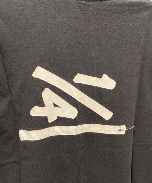 stussy（ステューシー）stussy (ステューシー) 25th Anniversary 1/4 プリントTシャツ ブラック サイズ:XLの古着・服飾アイテム