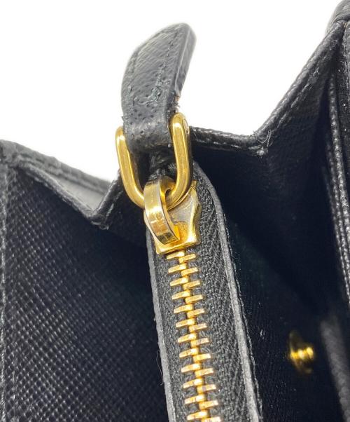 PRADA（プラダ）PRADA (プラダ) サフィアーノ フィオッコ リボン長財布 ブラックの古着・服飾アイテム