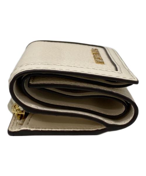 MICHAEL KORS（マイケルコース）MICHAEL KORS (マイケルコース) JET SET TRAVEL 3つ折り財布 アイボリーの古着・服飾アイテム