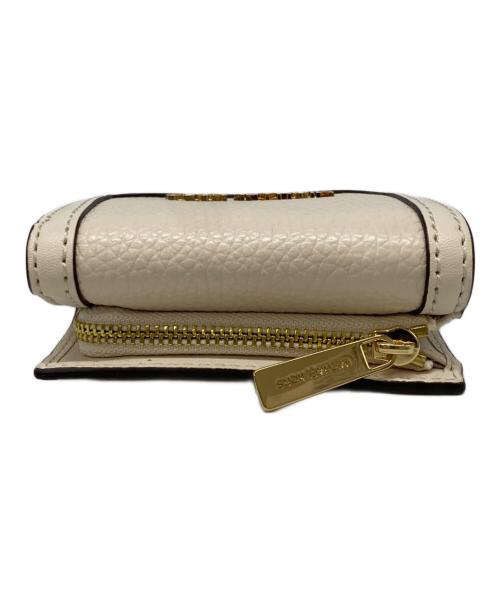 MICHAEL KORS（マイケルコース）MICHAEL KORS (マイケルコース) JET SET TRAVEL 3つ折り財布 アイボリーの古着・服飾アイテム