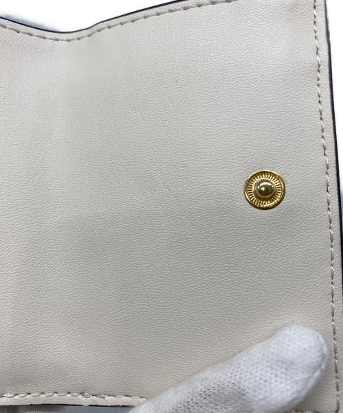 MICHAEL KORS（マイケルコース）MICHAEL KORS (マイケルコース) JET SET TRAVEL 3つ折り財布 アイボリーの古着・服飾アイテム